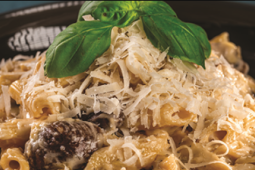 truffle penne pasta served with herbs